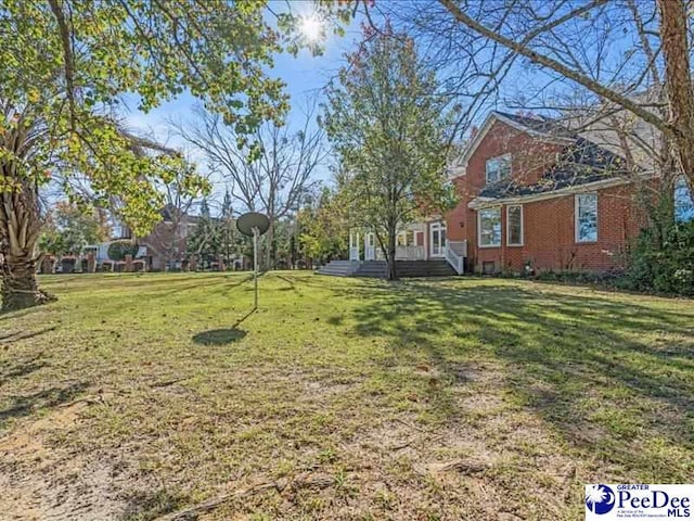 view of yard featuring a deck