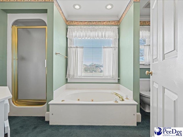 bathroom featuring ornamental molding, toilet, and separate shower and tub