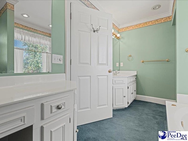 bathroom featuring ornamental molding and vanity