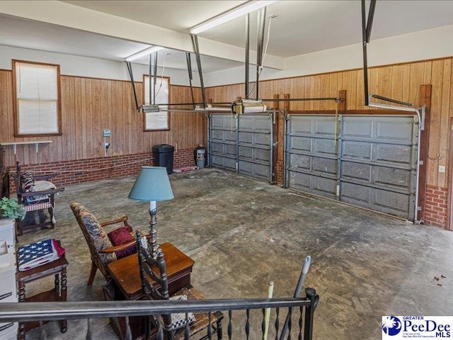 garage featuring wooden walls