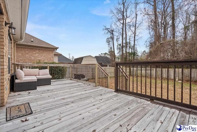 wooden deck featuring an outdoor living space