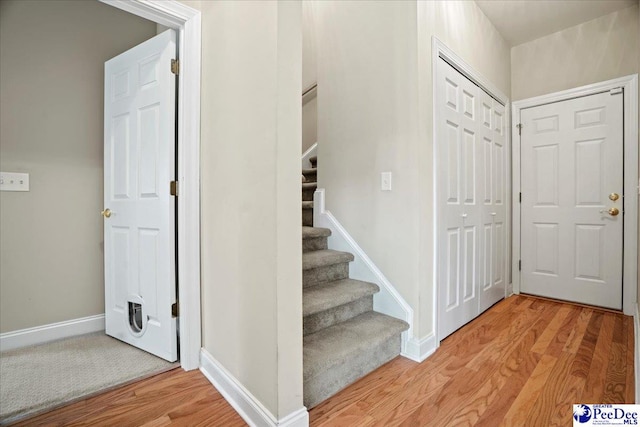 entrance foyer featuring light wood-type flooring