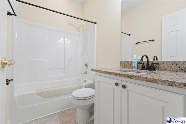 full bathroom with tile patterned flooring, vanity, tub / shower combination, and toilet