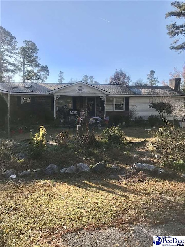 view of front of home with a patio