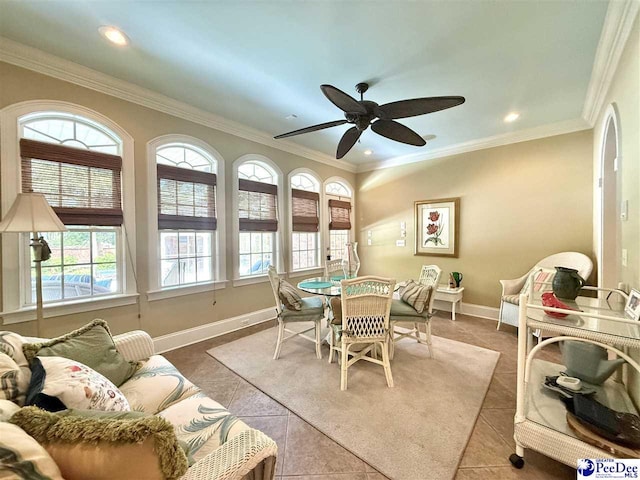 1219 Richard St, Dillon, SC 29536 - tiled dining room with crown molding, baseboards, a ceiling fan, and recessed lighting