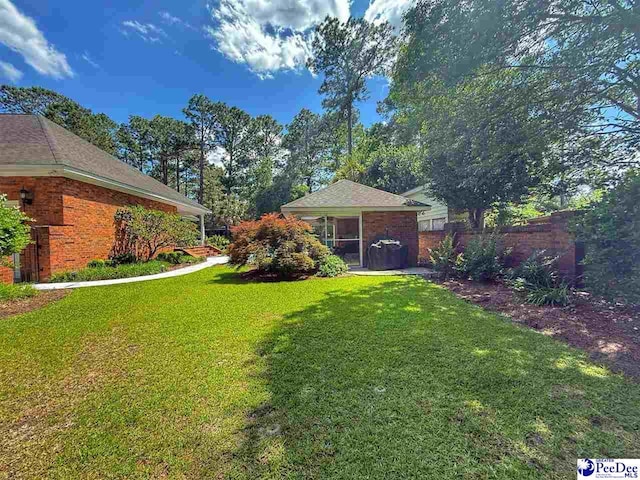 1219 Richard St, Dillon, SC 29536 - view of yard with a sunroom