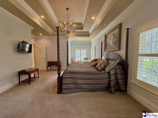 1219 Richard St, Dillon, SC 29536 - bedroom featuring light colored carpet, a chandelier, a raised ceiling, baseboards, and crown molding