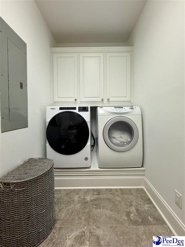1219 Richard St, Dillon, SC 29536 - washroom featuring washing machine and dryer, cabinet space, and electric panel