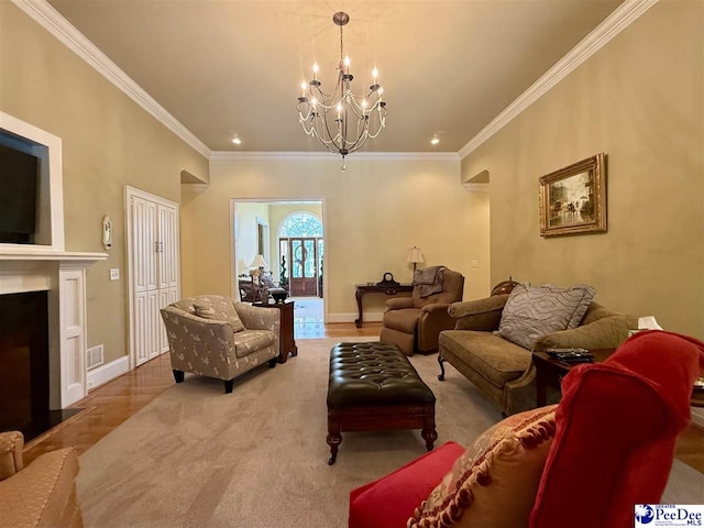 1219 Richard St, Dillon, SC 29536 - living area featuring a chandelier, crown molding, baseboards, a fireplace with flush hearth, and recessed lighting