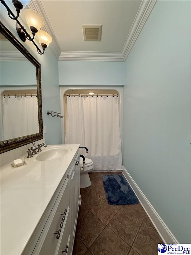 1219 Richard St, Dillon, SC 29536 - bathroom featuring ornamental molding, vanity, toilet, baseboards, and tile patterned floors