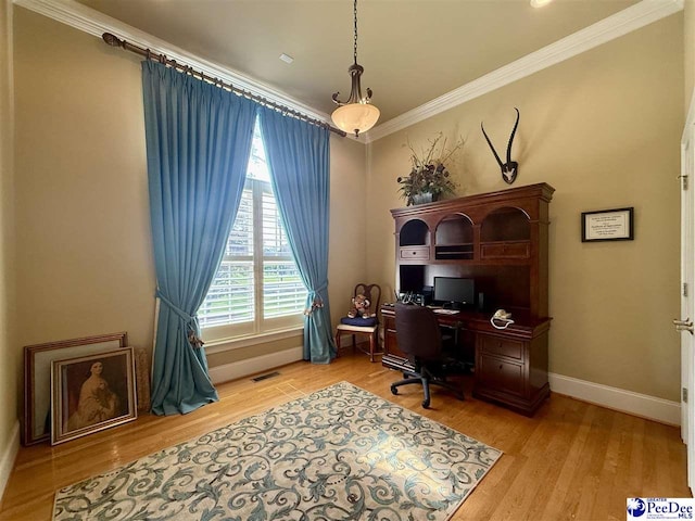 1219 Richard St, Dillon, SC 29536 - home office featuring ornamental molding, baseboards, and light wood-style floors