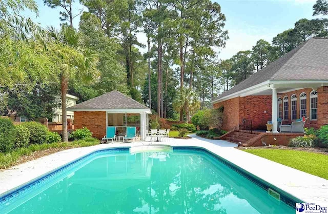 1219 Richard St, Dillon, SC 29536 - swimming pool with a patio and an outdoor structure