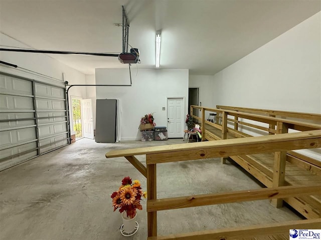 1219 Richard St, Dillon, SC 29536 - garage featuring a garage door opener
