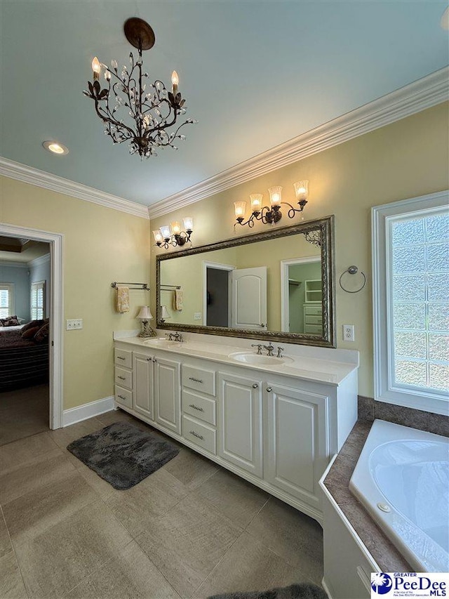 1219 Richard St, Dillon, SC 29536 - ensuite bathroom with ornamental molding, double vanity, a chandelier, a bathtub, and recessed lighting