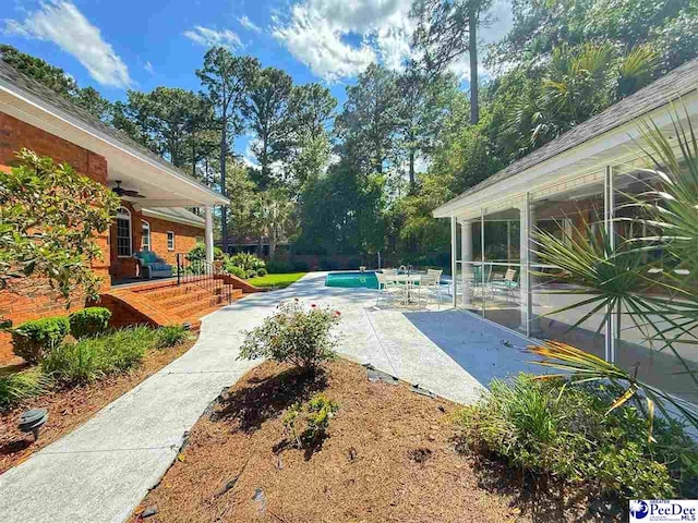 1219 Richard St, Dillon, SC 29536 - view of yard featuring a patio and an outdoor pool