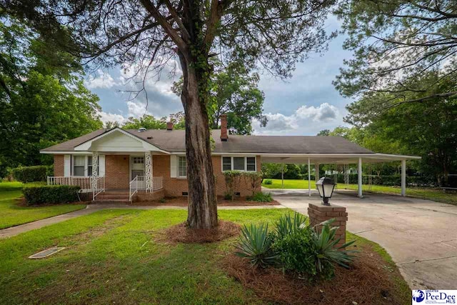 707 Chase St, Florence, SC 29501 - view of front of house with a chimney, an attached carport, driveway, brick siding, and crawl space