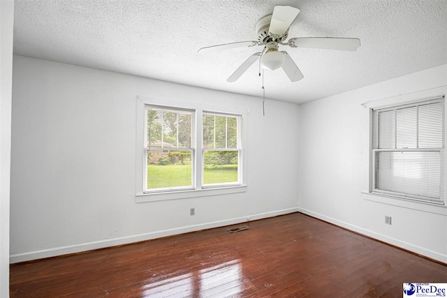 707 Chase St, Florence, SC 29501 - empty room featuring hardwood / wood-style floors, a textured ceiling, and a ceiling fan