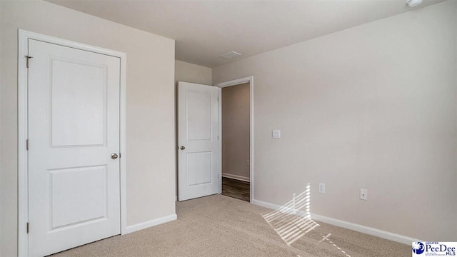 575 Strawberry Field Way, Galivants Ferry, SC 29544 - unfurnished bedroom featuring carpet flooring and baseboards