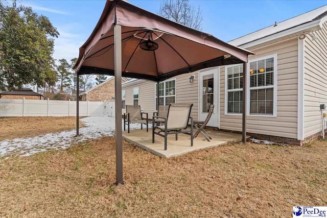 exterior space with a lawn, a gazebo, and a patio area