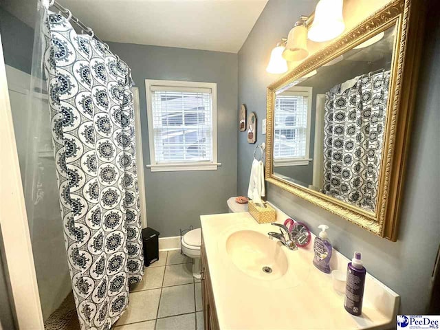 59 Lynn Ave, Cheraw, SC 29520 - full bath with vanity, toilet, tile patterned flooring, a shower with shower curtain, and baseboards
