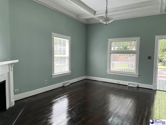 101 W Baptist St, Marion, SC 29571 - unfurnished living room with dark wood finished floors, healthy amount of natural light, ornamental molding, coffered ceiling, and beam ceiling