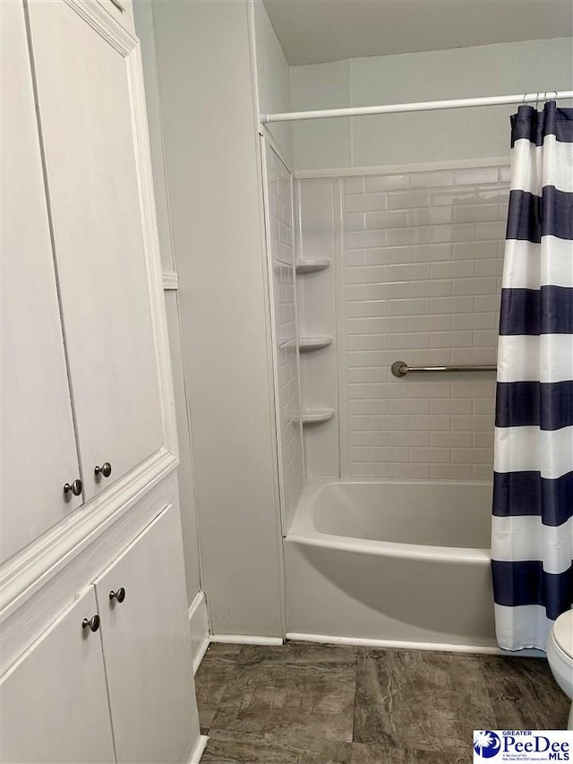 101 W Baptist St, Marion, SC 29571 - bathroom featuring shower / tub combo with curtain and toilet