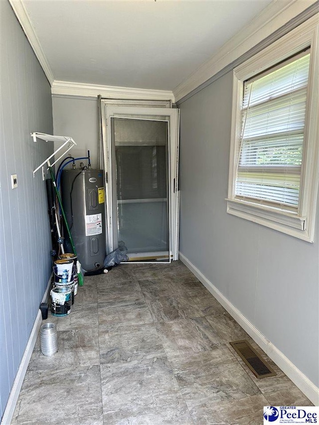 101 W Baptist St, Marion, SC 29571 - utility room with water heater