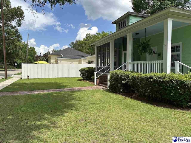 101 W Baptist St, Marion, SC 29571 - view of yard featuring a sunroom