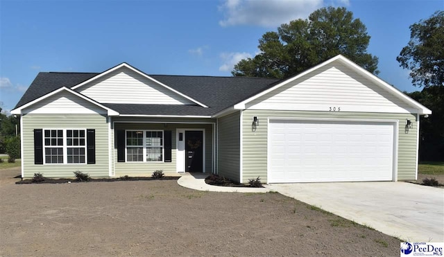 ranch-style house featuring a garage