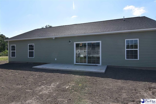 rear view of house featuring a patio