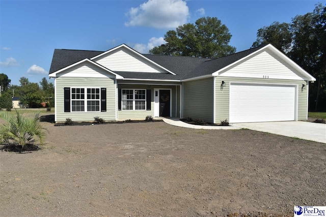 ranch-style home featuring a garage