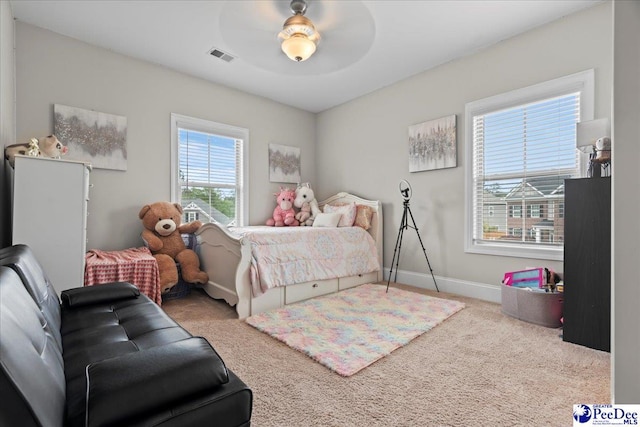 207 Compass Trl, Blythewood, SC 29016 - carpeted bedroom with baseboards, a ceiling fan, and visible vents