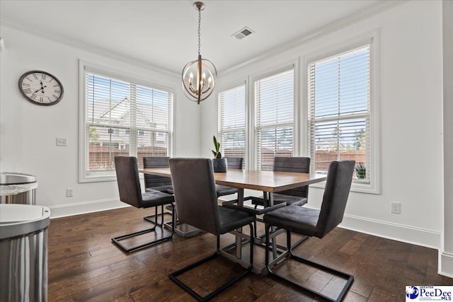207 Compass Trl, Blythewood, SC 29016 - dining room with an inviting chandelier, dark wood-type flooring, visible vents, and crown molding