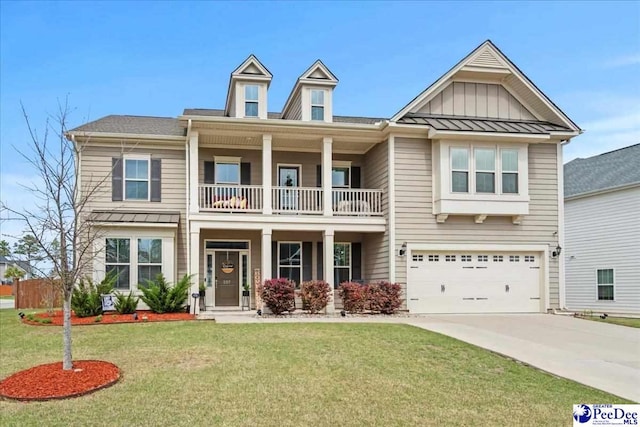 207 Compass Trl, Blythewood, SC 29016 - view of front of property featuring a balcony, driveway, a garage, a front yard, and a standing seam roof