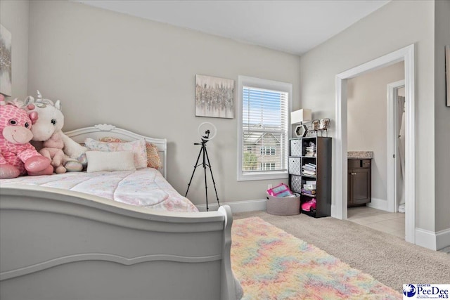 207 Compass Trl, Blythewood, SC 29016 - carpeted bedroom with ensuite bathroom and baseboards