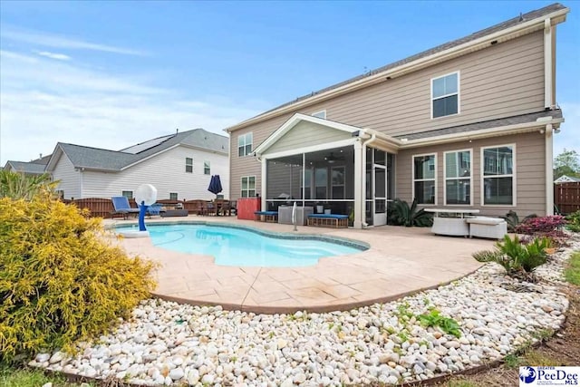 207 Compass Trl, Blythewood, SC 29016 - back of house with a patio area, fence, and a sunroom