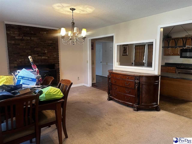 dining space with a chandelier, light carpet, a textured ceiling, and baseboards