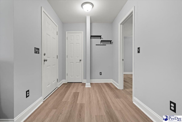 3324 Spiral Ln, Effingham, SC 29541 - entryway with baseboards and light wood-style flooring