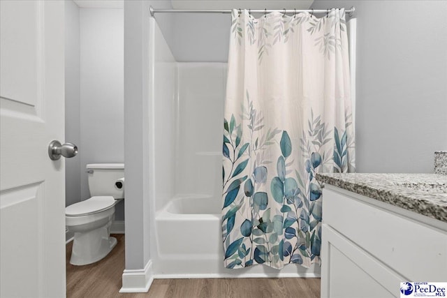 3324 Spiral Ln, Effingham, SC 29541 - bathroom featuring toilet, wood finished floors, shower / tub combo, baseboards, and vanity