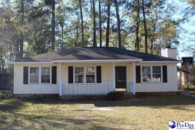 ranch-style house with a front lawn and a porch