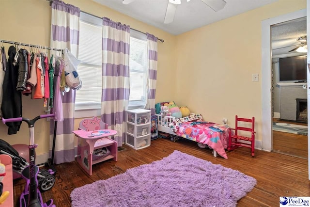 427 Marlboro Ave, Hartsville, SC 29550 - bedroom featuring ceiling fan and dark hardwood / wood-style flooring