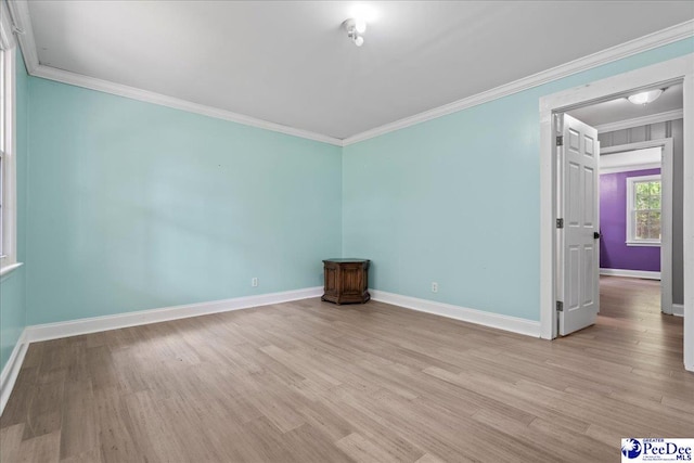 821 W Shirley Rd, Pamplico, SC 29583 - unfurnished room featuring ornamental molding, light wood-type flooring, and baseboards