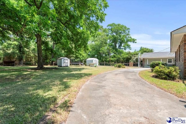 821 W Shirley Rd, Pamplico, SC 29583 - view of grassy yard with driveway