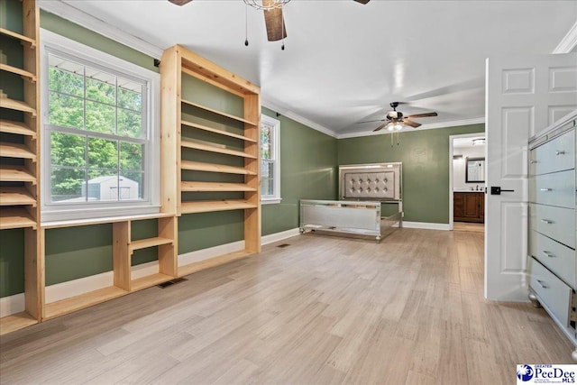 821 W Shirley Rd, Pamplico, SC 29583 - unfurnished bedroom with ornamental molding, wood finished floors, baseboards, multiple windows, and ceiling fan