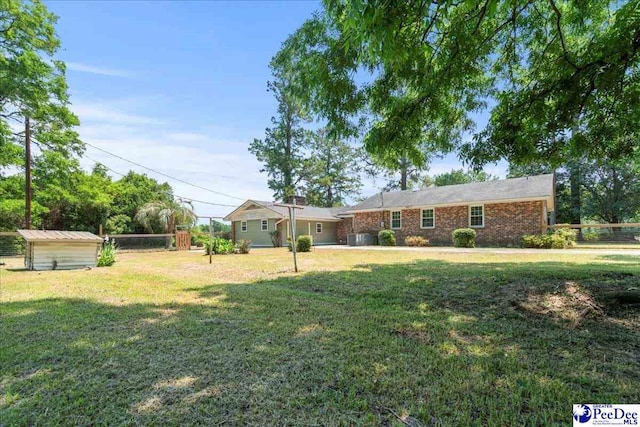 821 W Shirley Rd, Pamplico, SC 29583 - view of front of house with brick siding