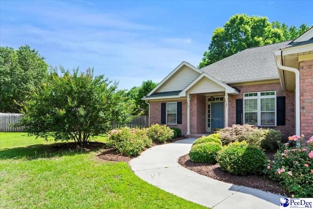 2264 Inverness Dr, Florence, SC 29505 - view of front facade featuring brick siding and a shingled roof