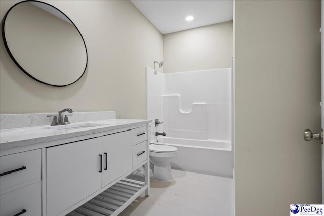 full bathroom featuring vanity, toilet, and bathing tub / shower combination