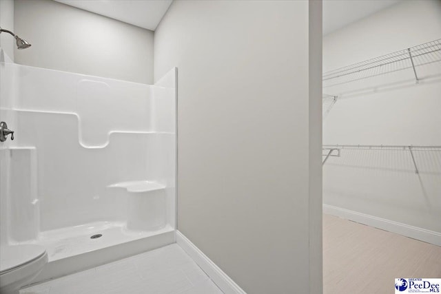 bathroom with walk in shower