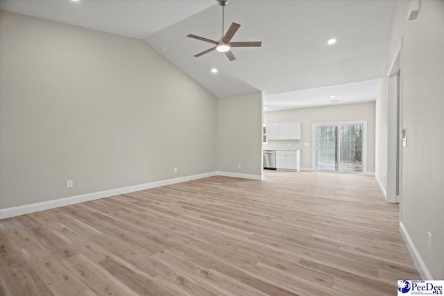 unfurnished living room with ceiling fan, vaulted ceiling, and light hardwood / wood-style floors