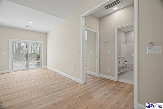 empty room featuring light hardwood / wood-style floors